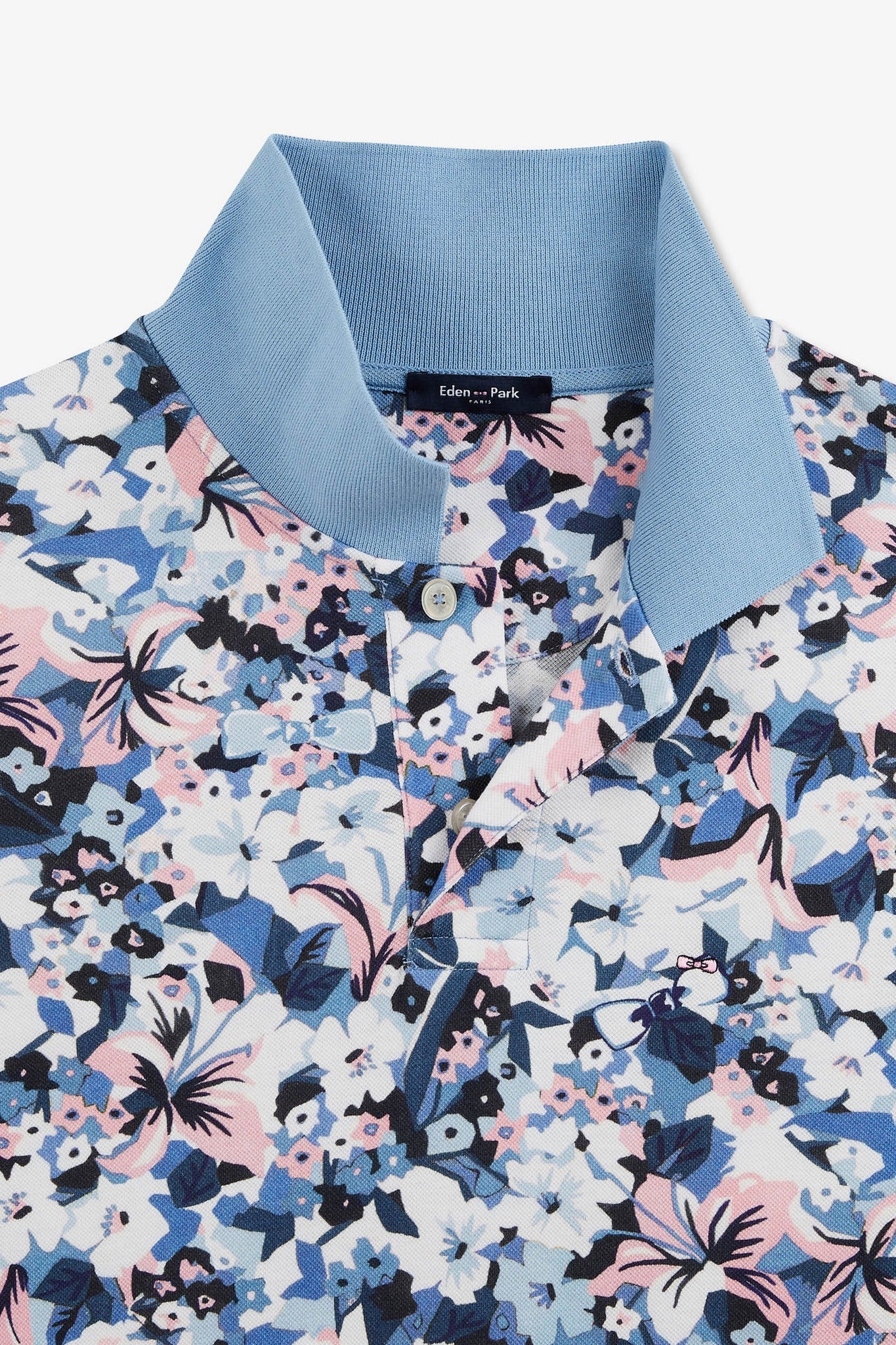 Light blue short-sleeved polo shirt with flower print