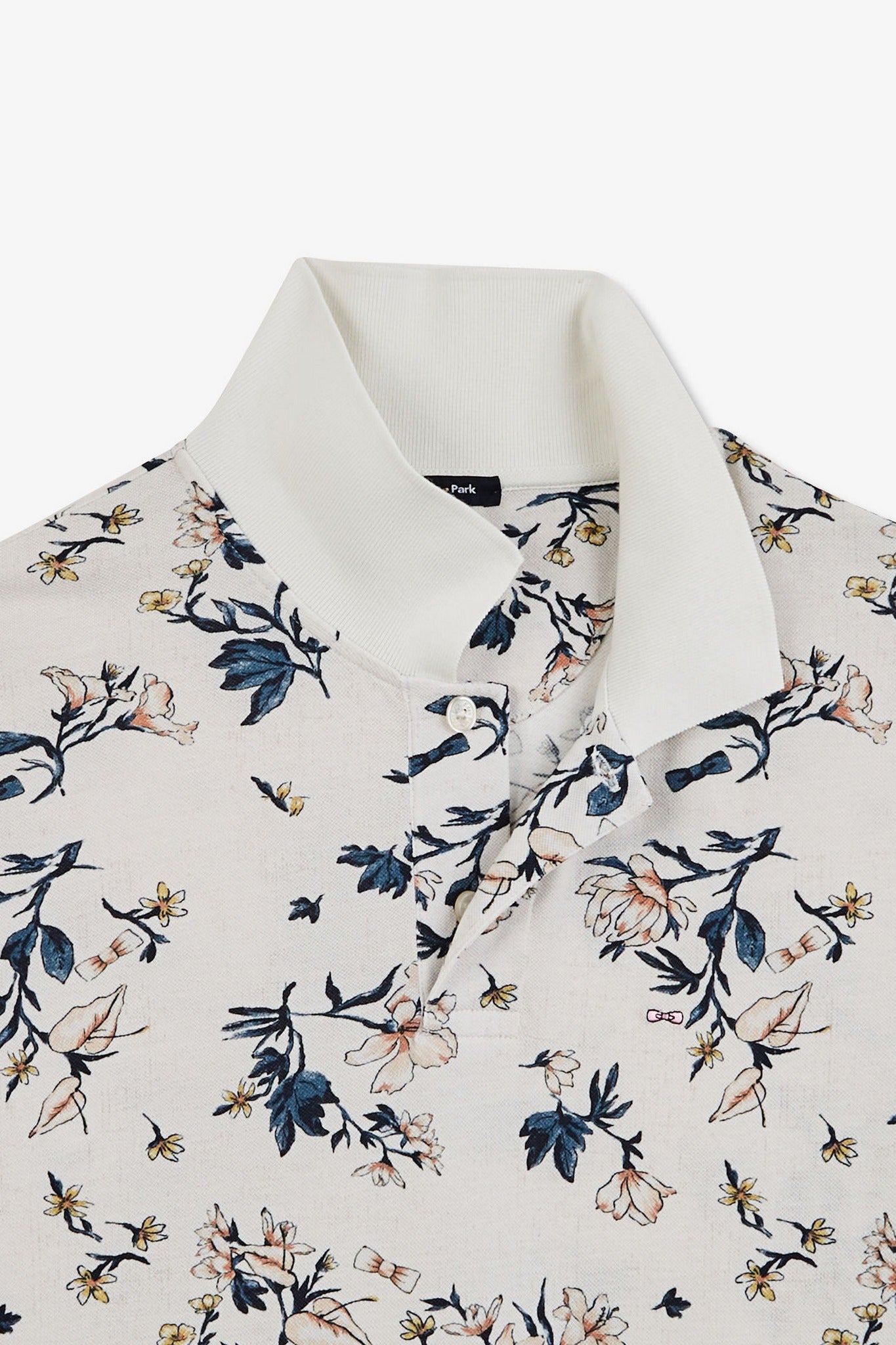 Polo blanc imprimé exclusif fleuri