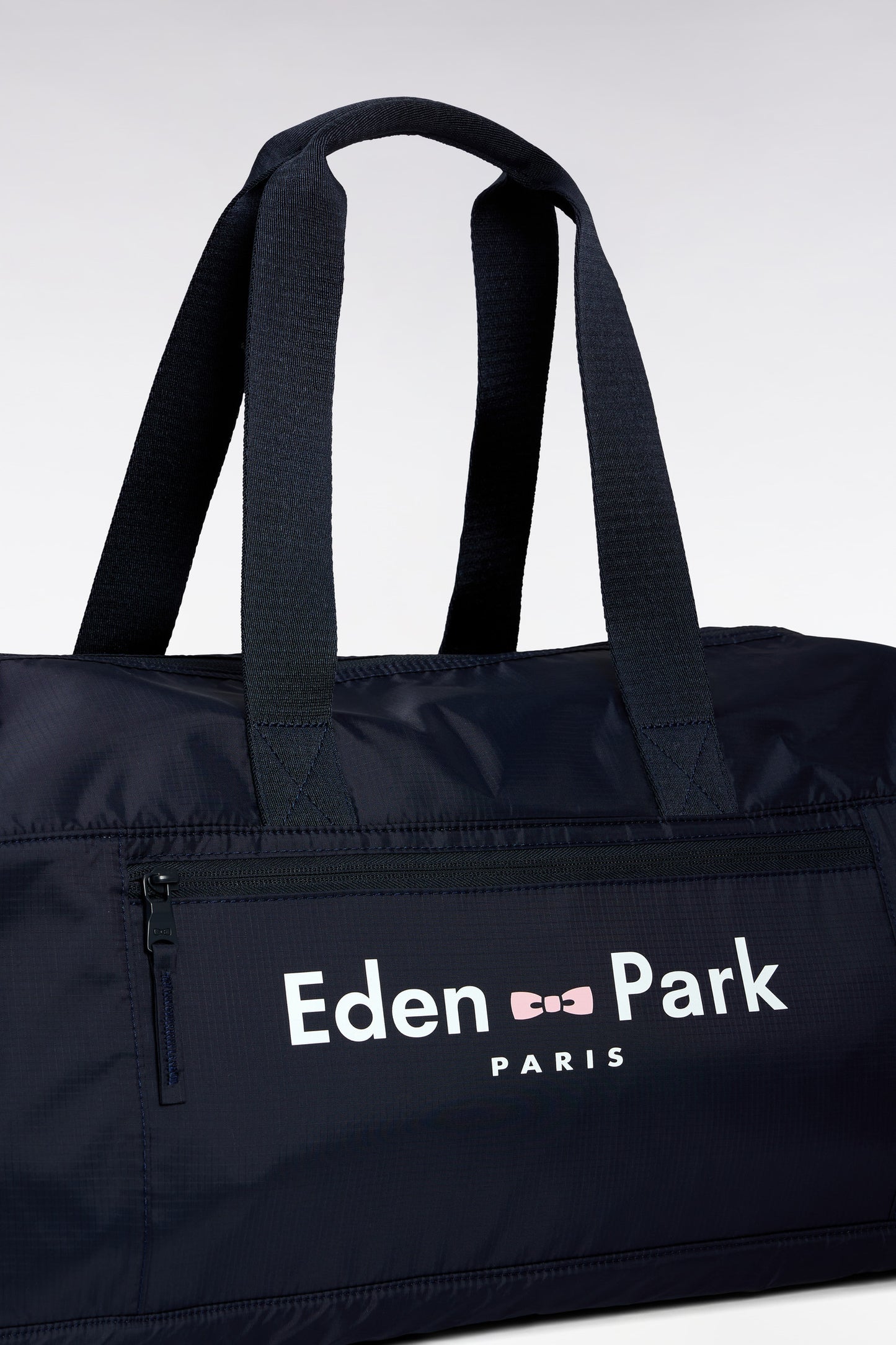 Navy blue duffle bag with Eden Park logo