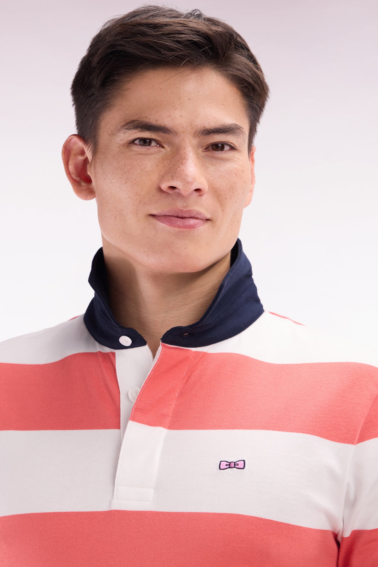 Straight short-sleeved rugby shirt in coral pink and white striped Pima cotton
