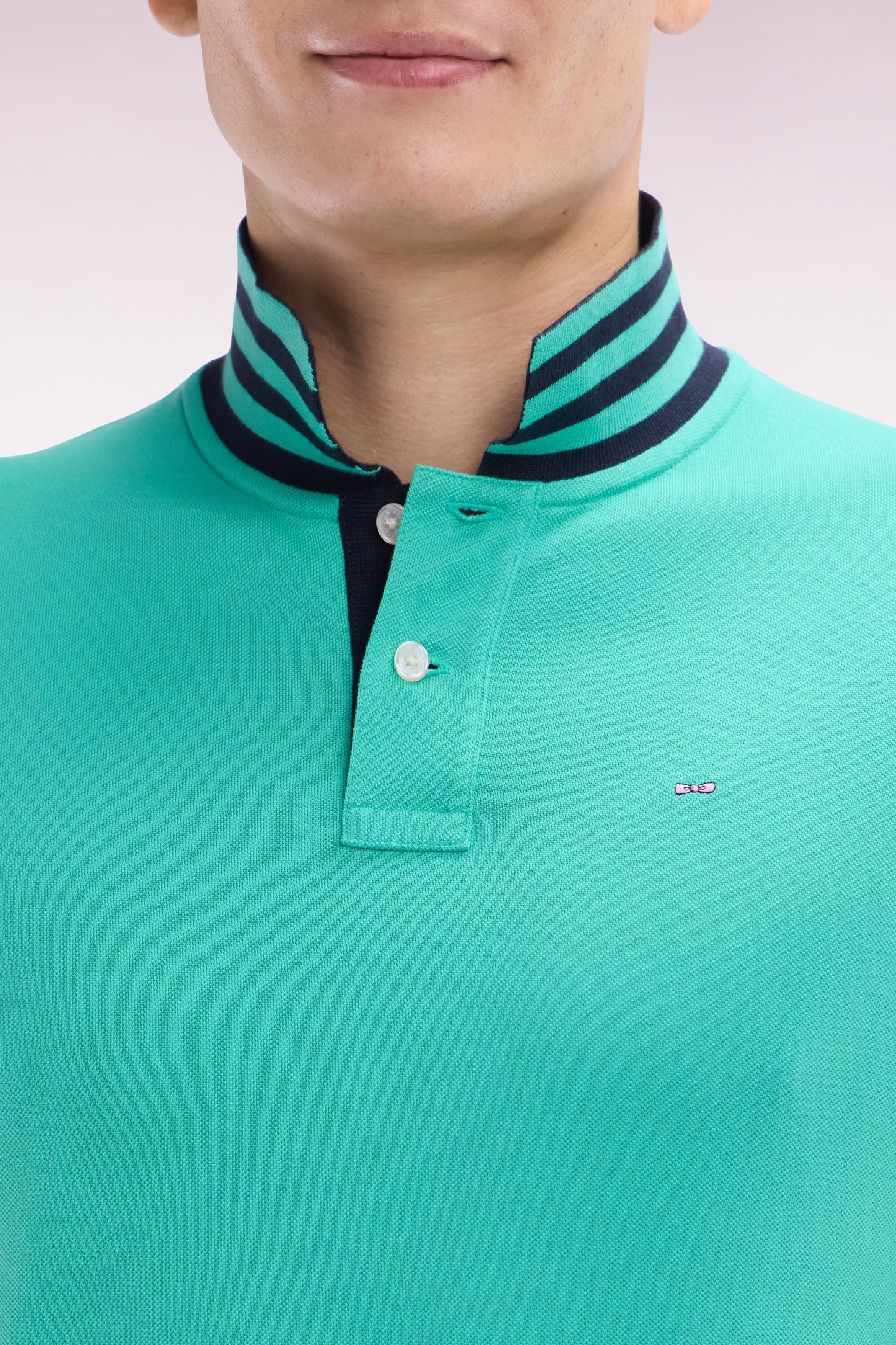 Straight-cut short-sleeved polo shirt in green Pima cotton piqué with striped under collar