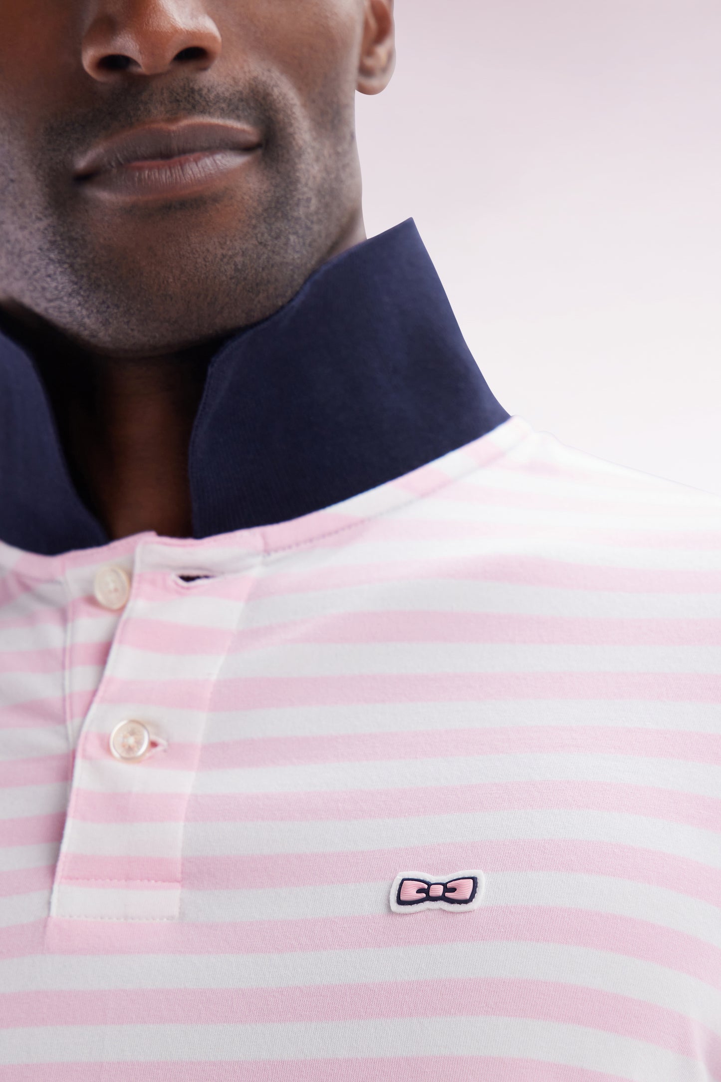 Slim-fit short-sleeved sailor polo shirt in pink striped stretch cotton
