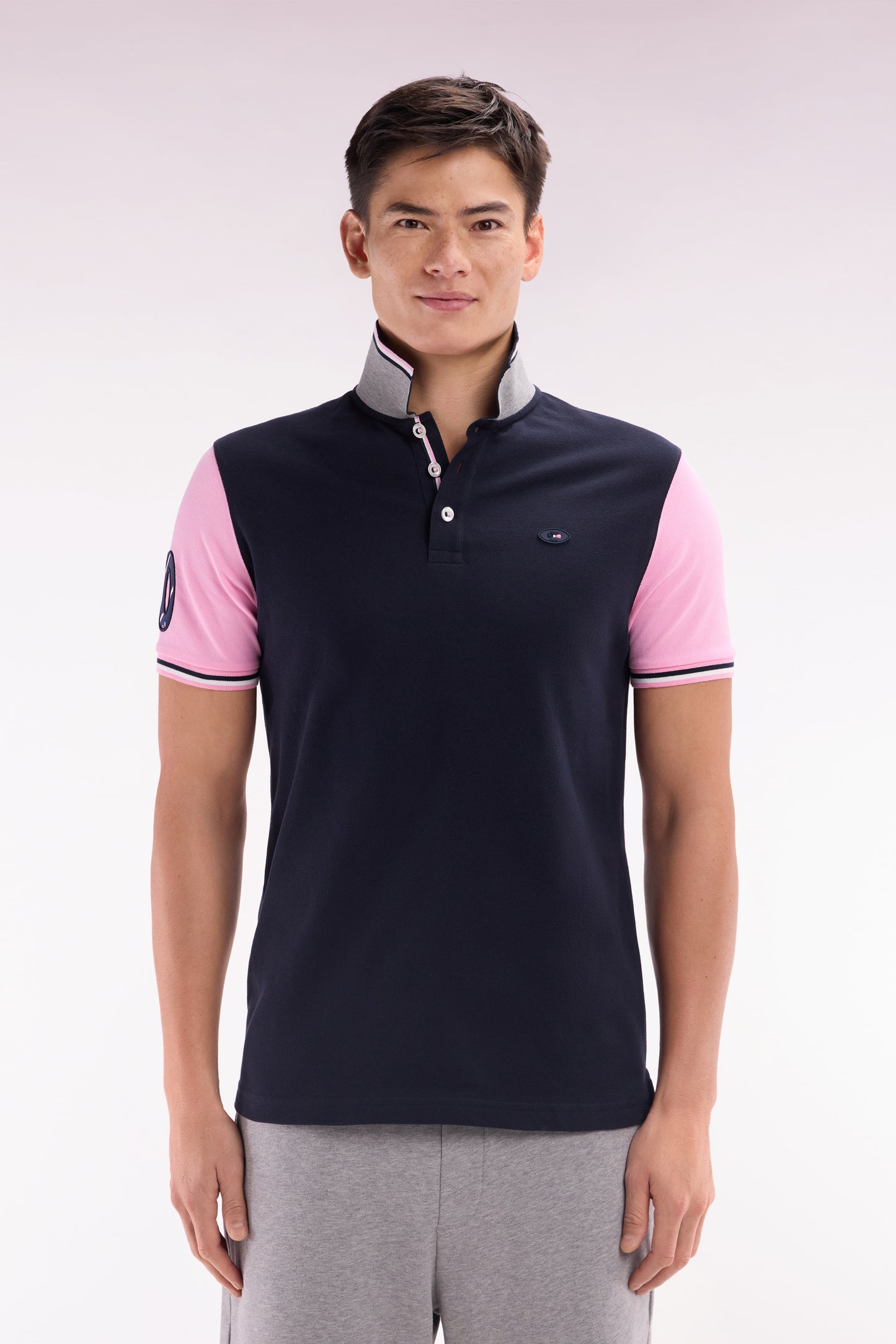Straight-fit short-sleeved polo shirt in navy cotton piqué with 10 embroidery