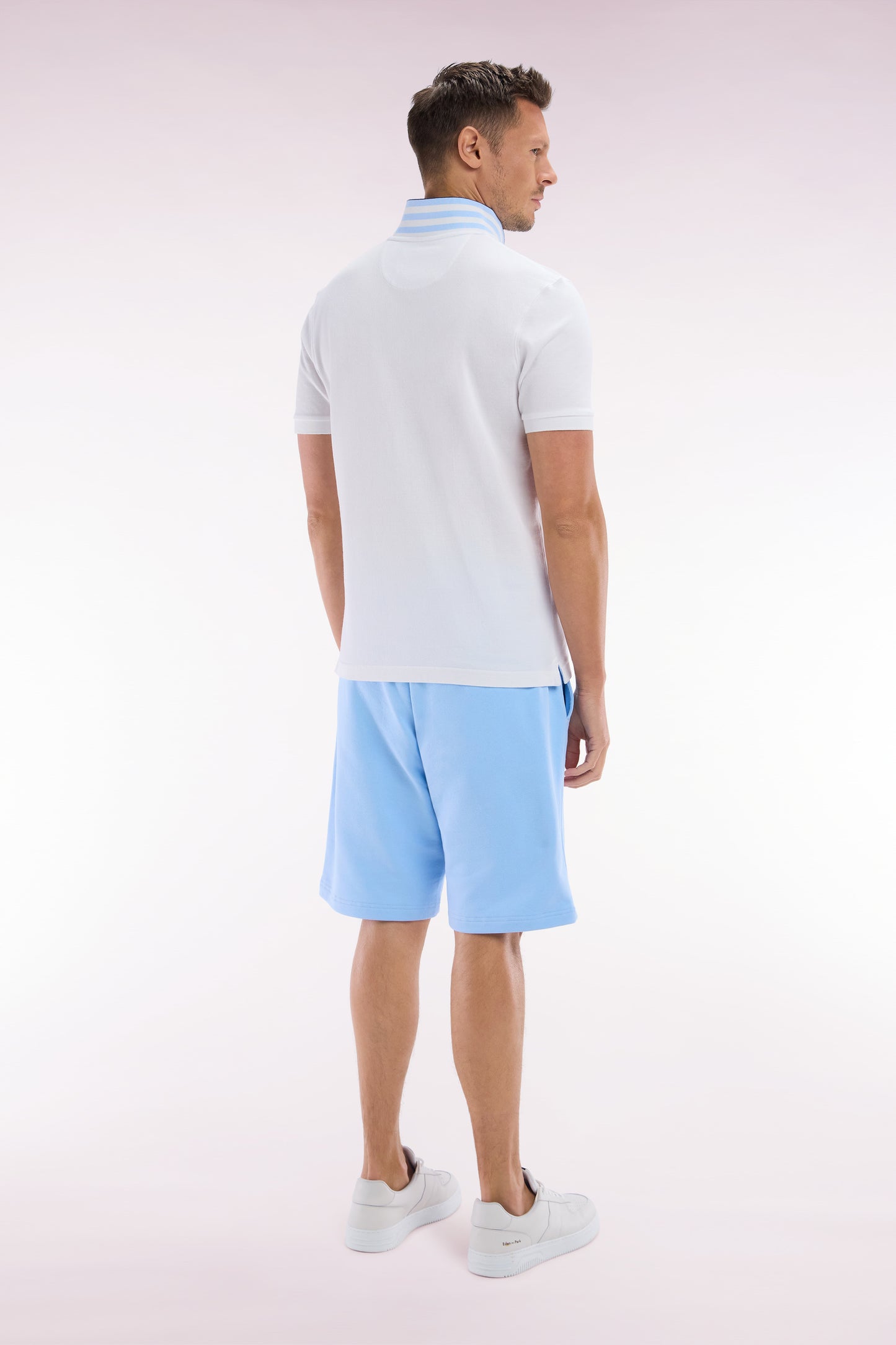 Relaxed-fit sky blue cotton fleece shorts with a striped bow tie embroidery