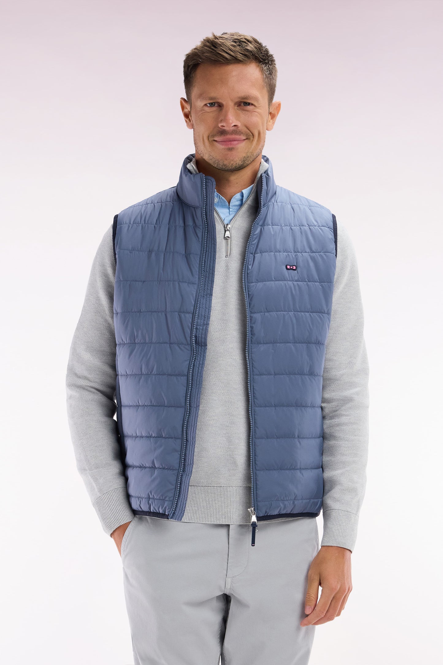 Sleeveless grey down jacket