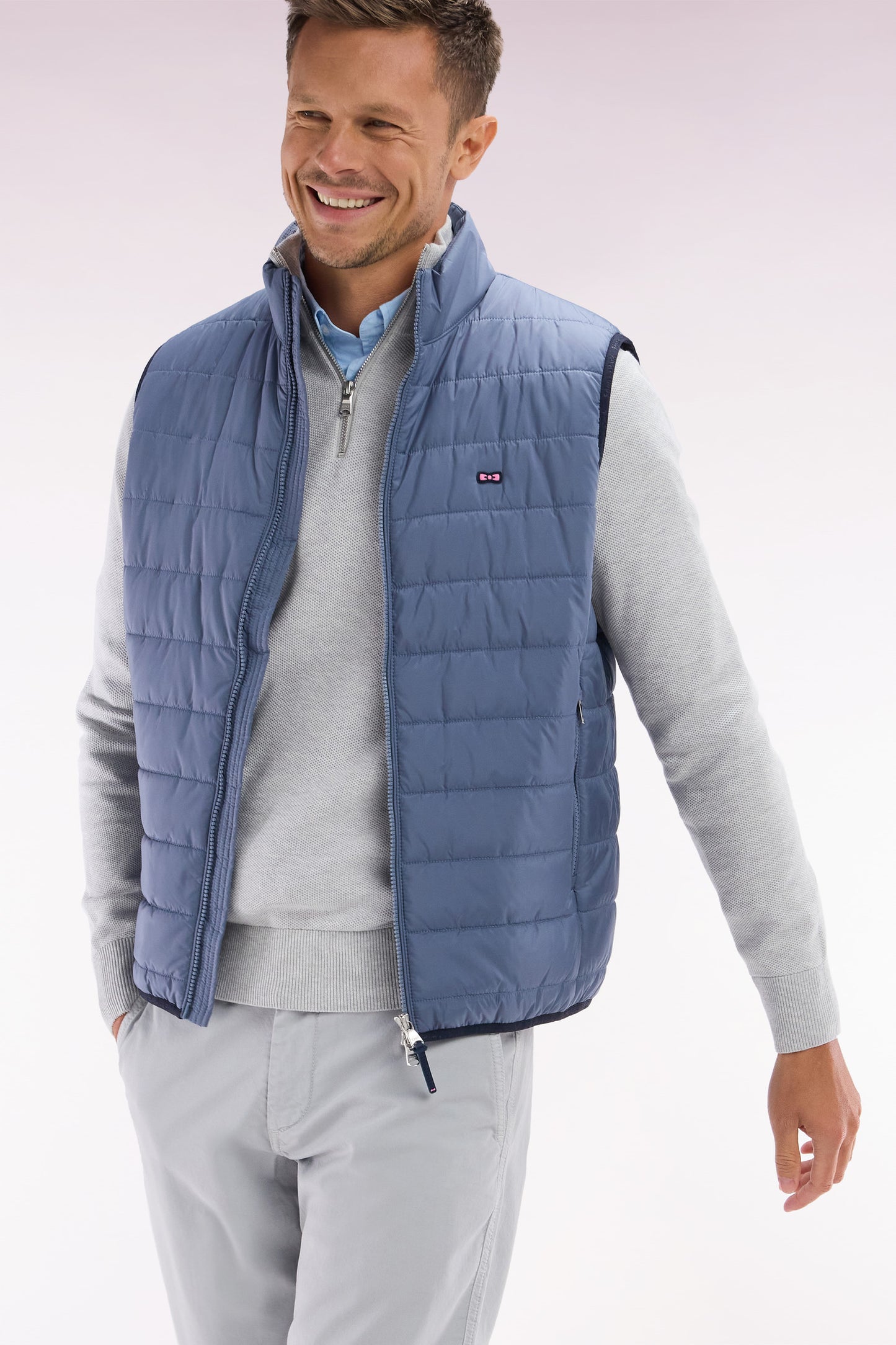 Sleeveless grey down jacket