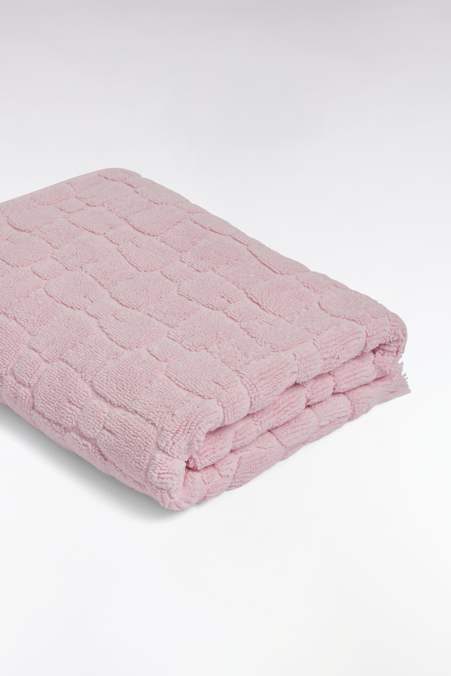 Serviette de toilette en coton rose à micromotifs nœuds papillon