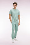 Jogging uni en molleton coton vert d'eau coupe regular