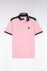 Polo à manches courtes en piqué coton rose à découpes marine