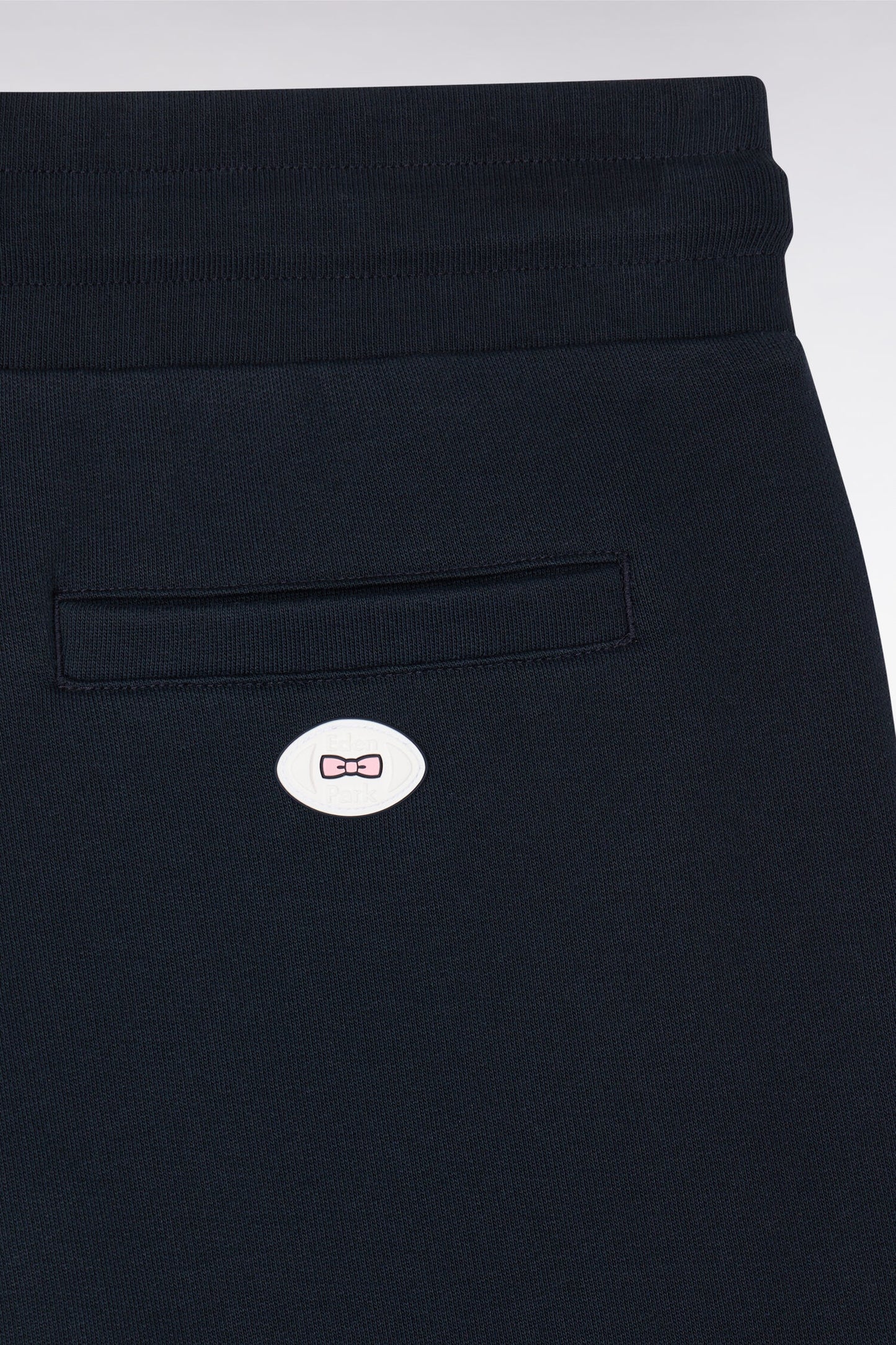 Short en molleton marine à bordures de jambe rayées