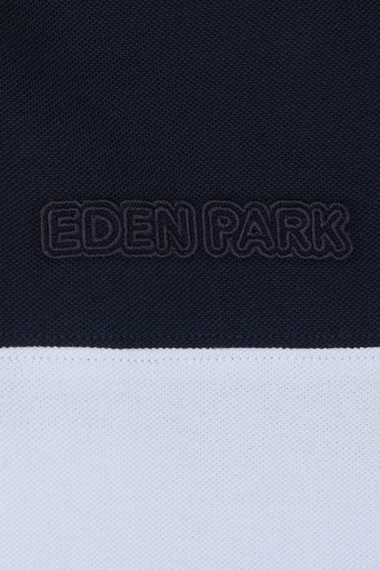 Polo manches courtes en piqué coton ciel détails contrastés broderie nœud papillon coupe Regular