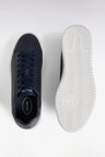 Low sneakers in navy grained leather