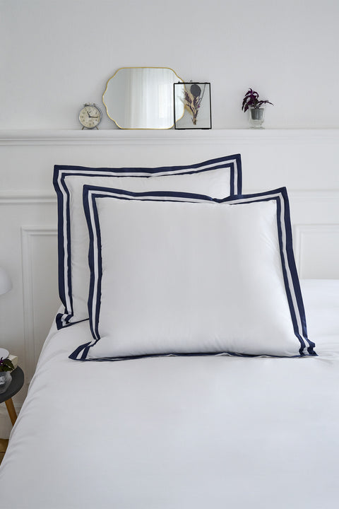 Set of square pillowcases in white cotton with navy trim - Image 1