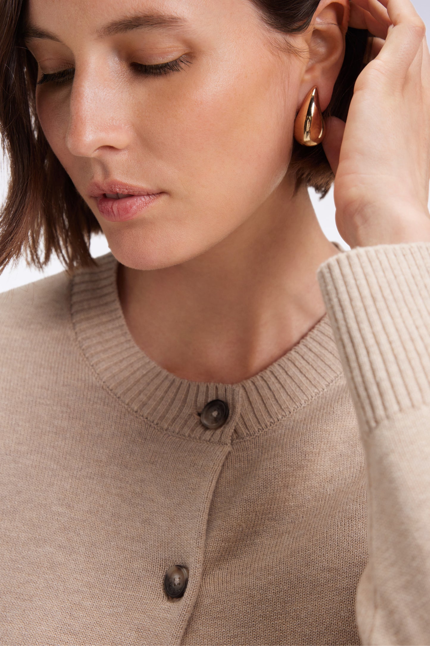 Cardigan in wool and beige cotton Relaxed cut