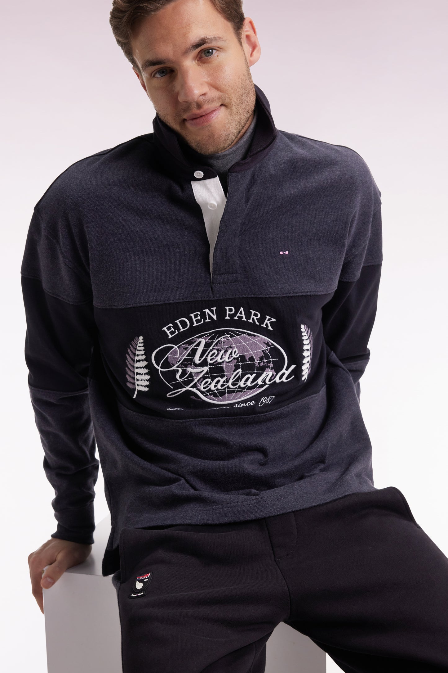 Black and grey long-sleeved jersey with New Zealand embroidery