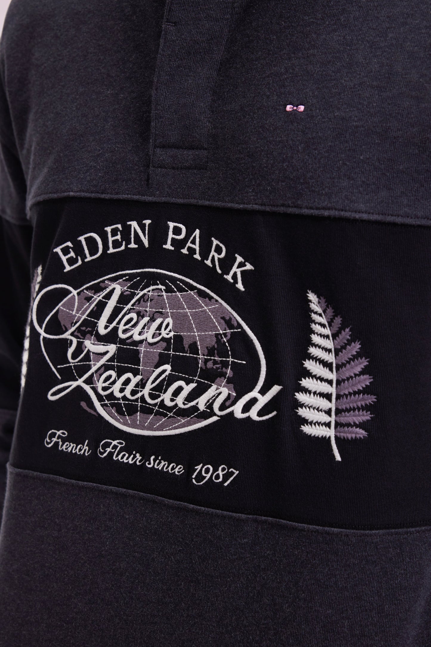 Black and grey long-sleeved jersey with New Zealand embroidery