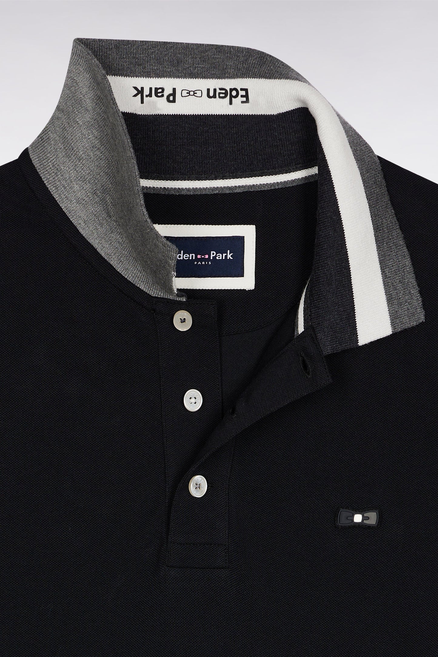 Short-sleeved polo shirt in black cotton with tricolored details, loose fit