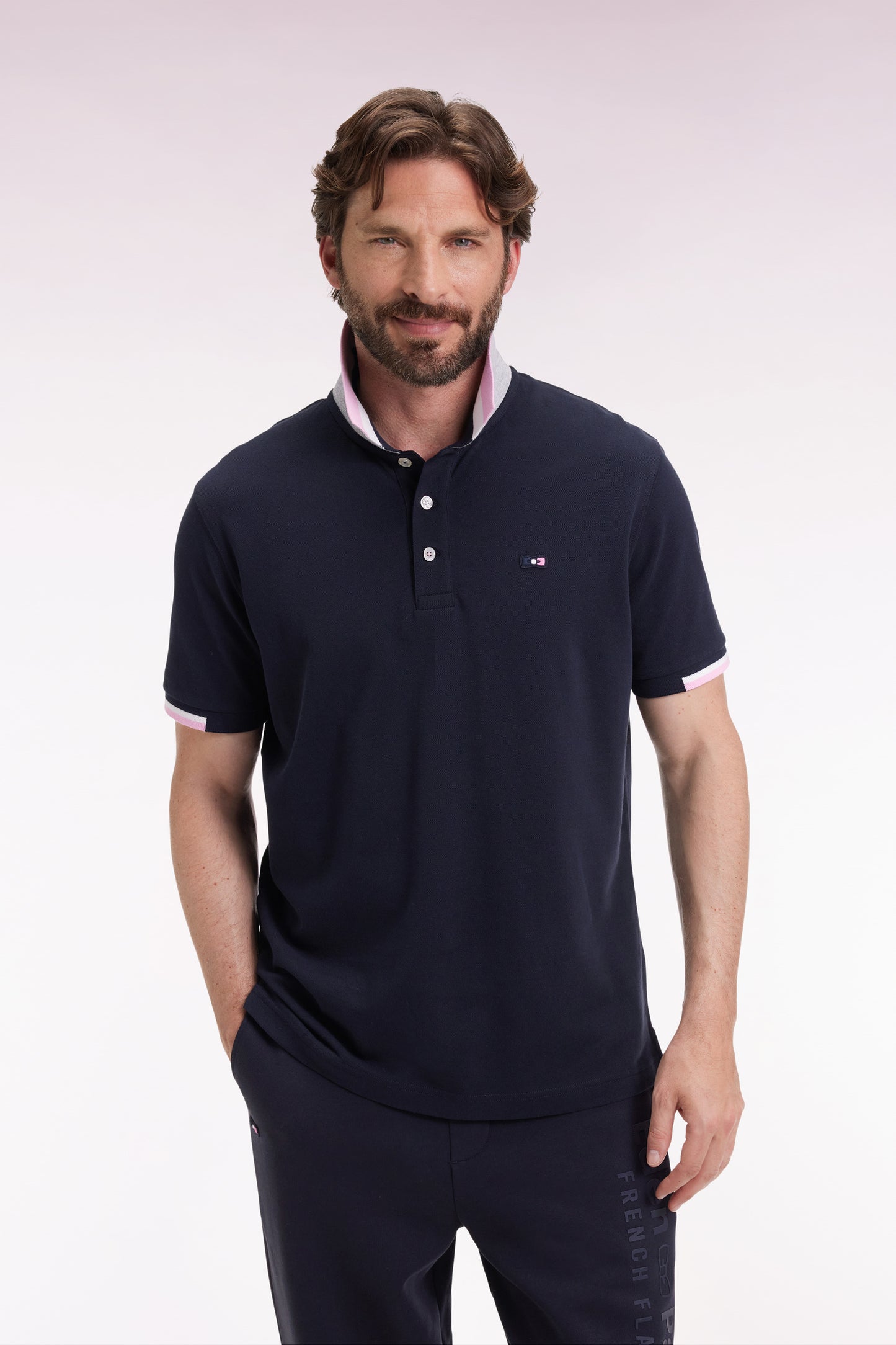 Short-sleeved polo shirt in navy cotton with tricolored details, loose fit