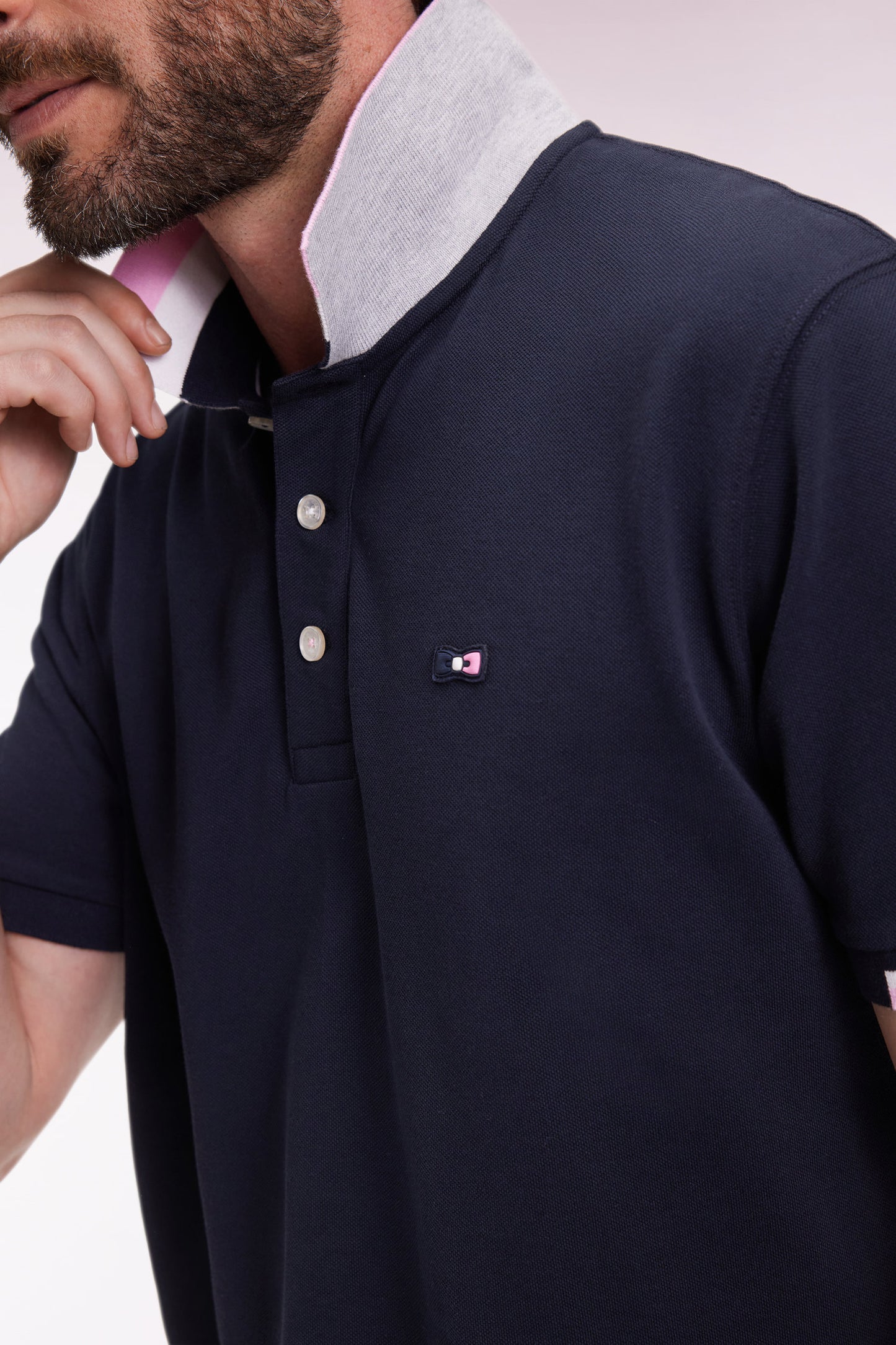 Short-sleeved polo shirt in navy cotton with tricolored details, loose fit