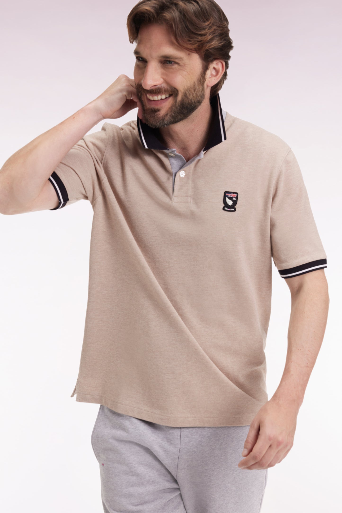 New Zealand short-sleeved polo shirt in beige cotton piqué, loose fit