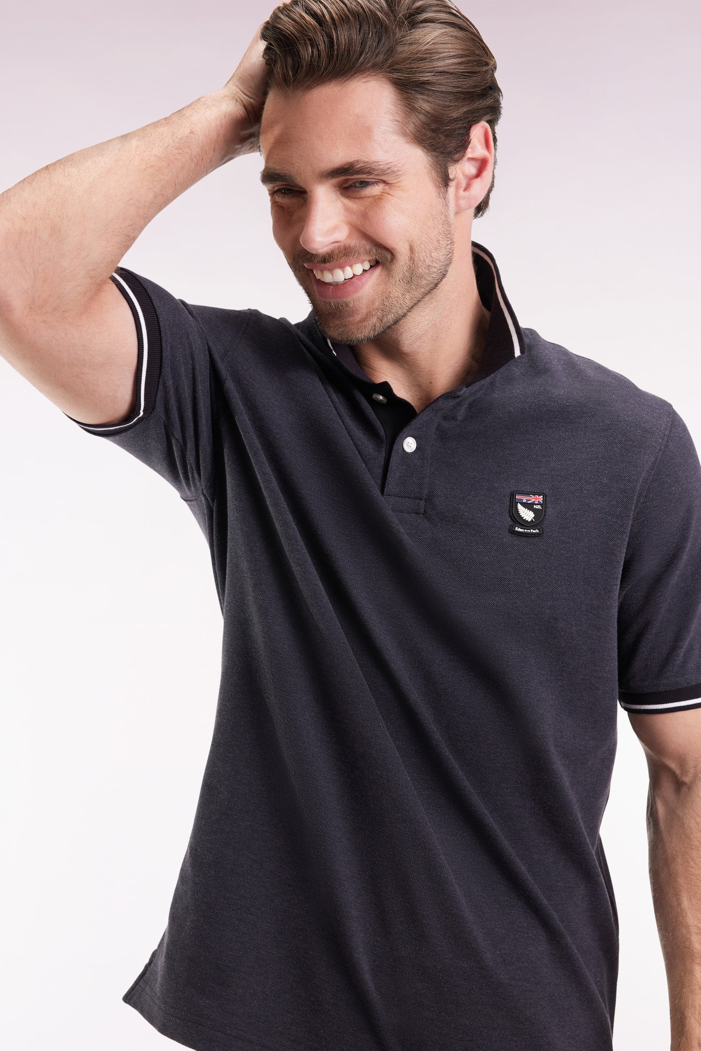 New Zealand short-sleeved polo shirt in grey cotton piqué, loose fit