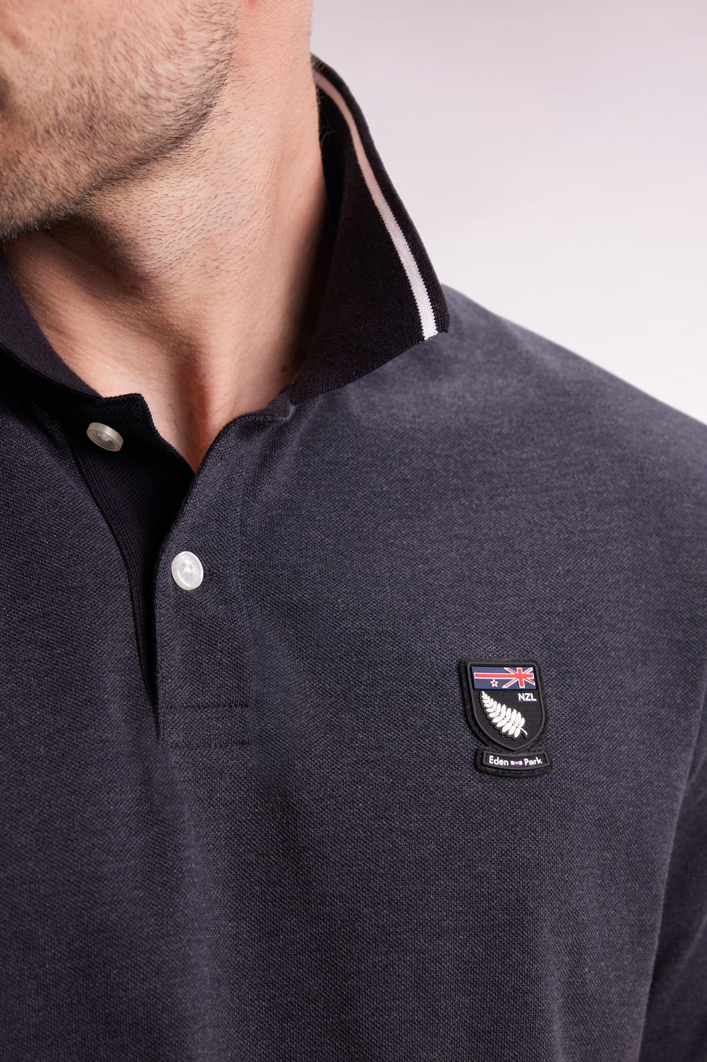 New Zealand short-sleeved polo shirt in grey cotton piqué, loose fit