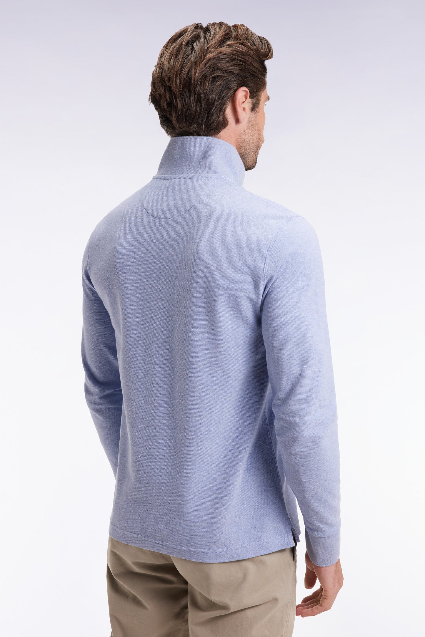 Long-sleeved polo shirt in sky-blue mottled cotton, straight cut