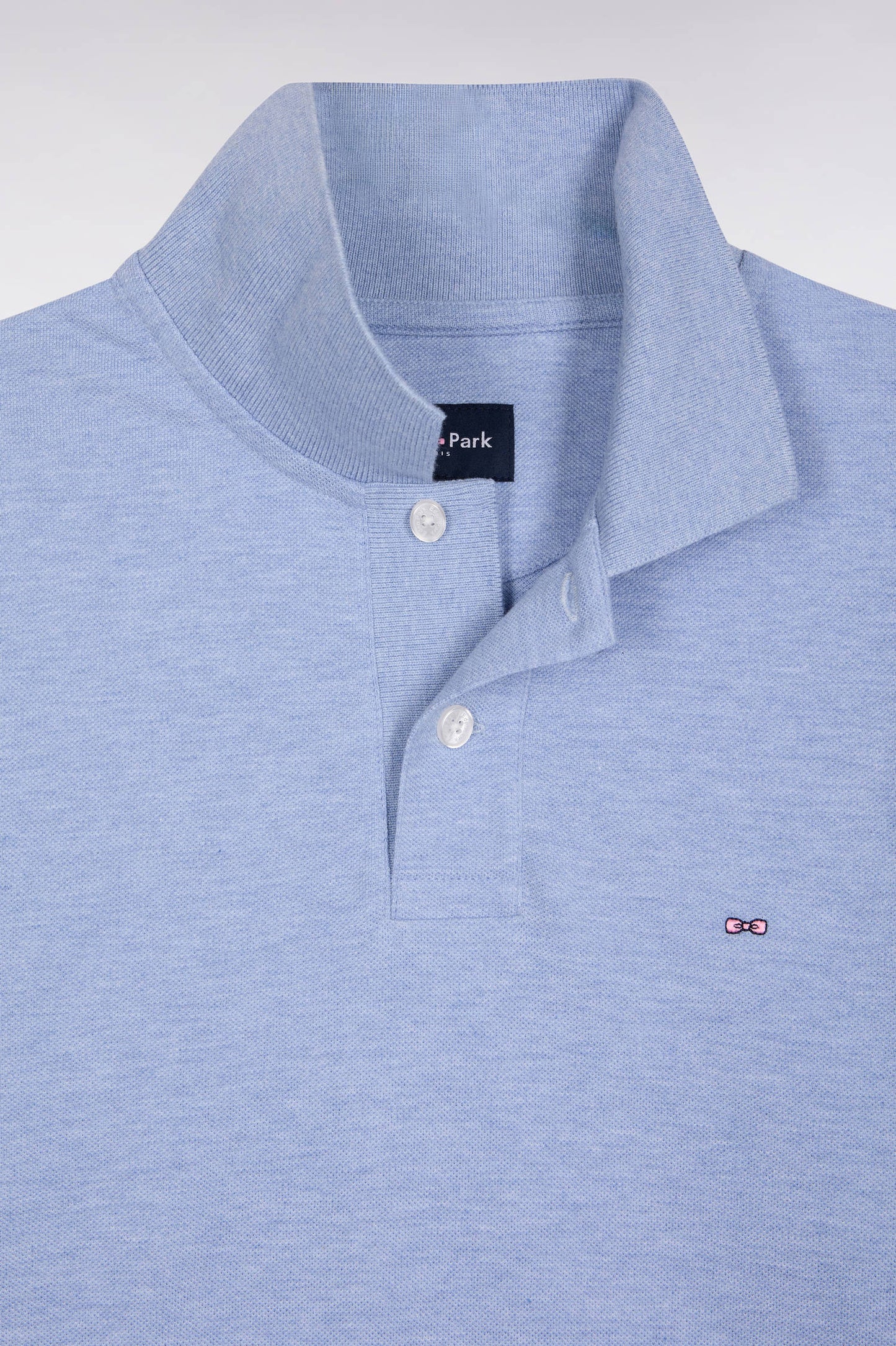 Long-sleeved polo shirt in sky-blue mottled cotton, straight cut