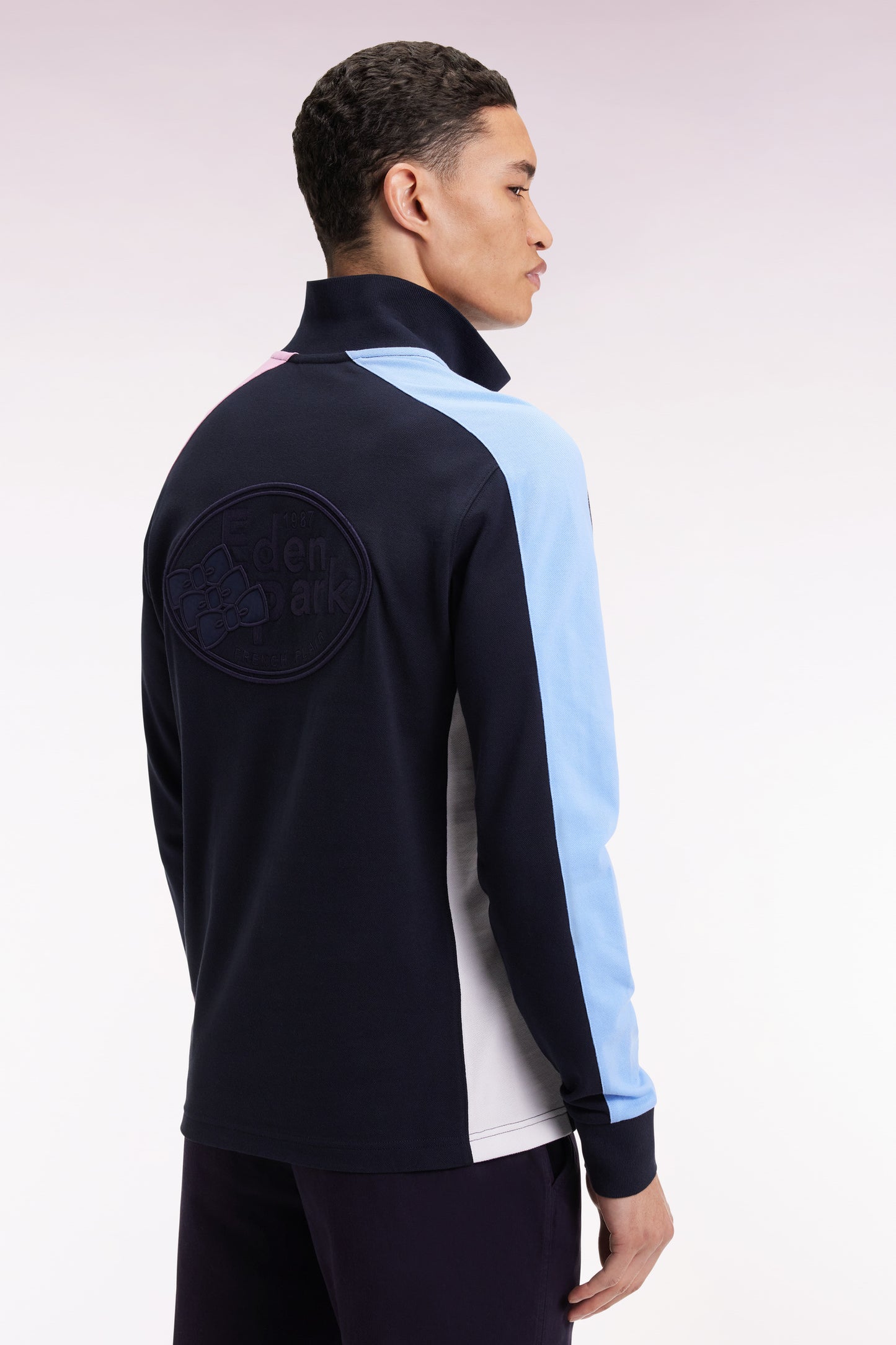 Long-sleeved navy polo shirt with tri-color cut-out sleeves