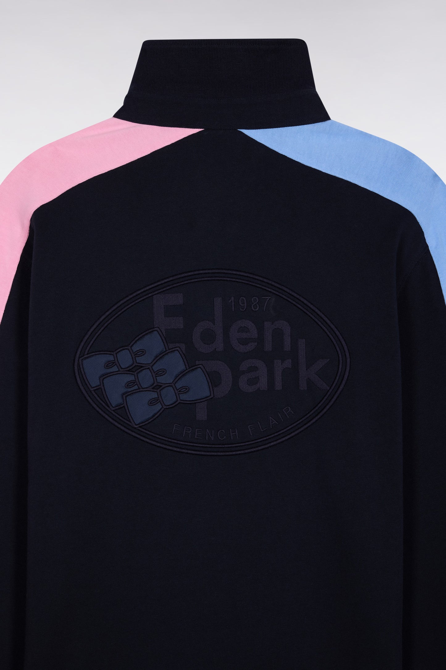 Long-sleeved navy polo shirt with tri-color cut-out sleeves