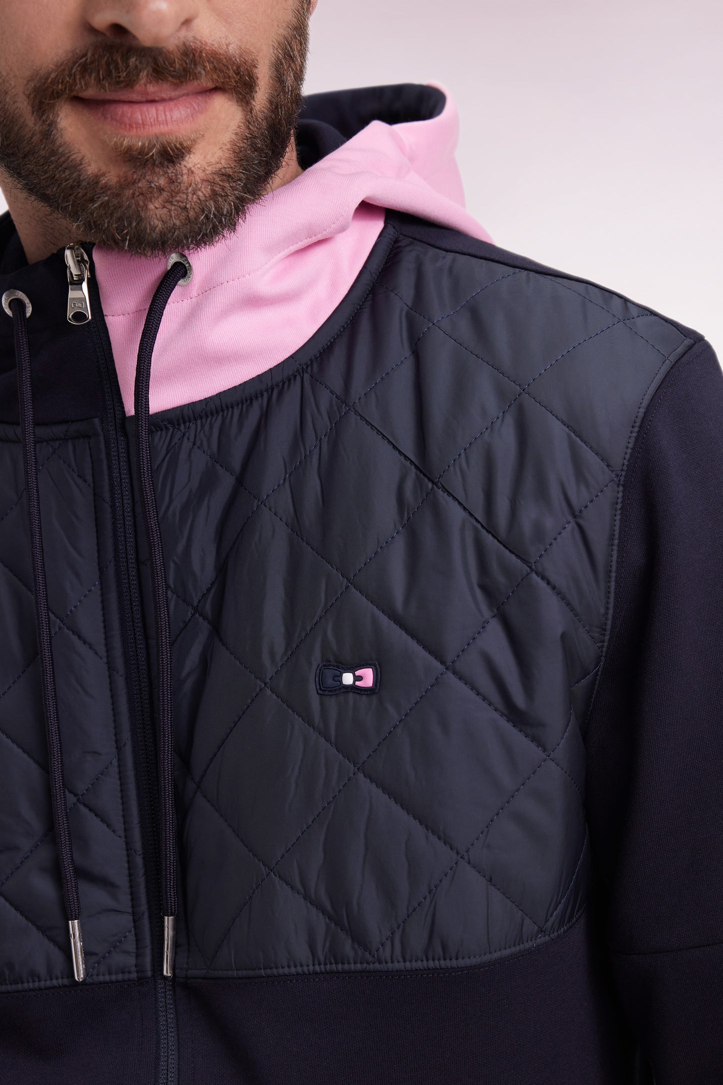 Sweatshirt zippé en interlock bimatière matelassé marine et rose