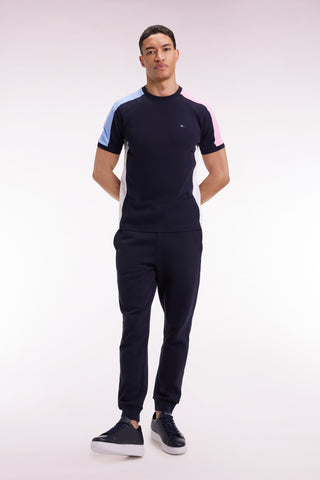 Short-sleeved navy cotton T-shirt with colorful cut-outs