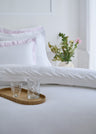 Housse de couette en percale de coton blanche bordures roses rayées
