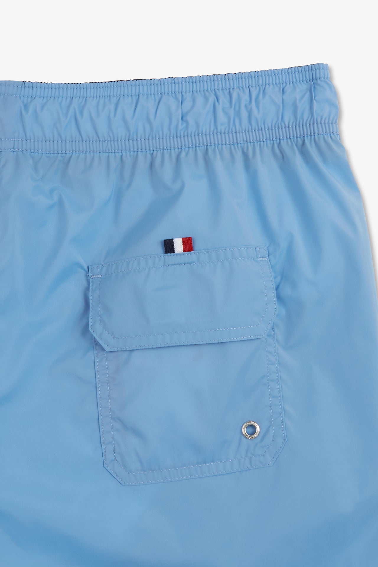 Short de bain uni détail bandes tricolores