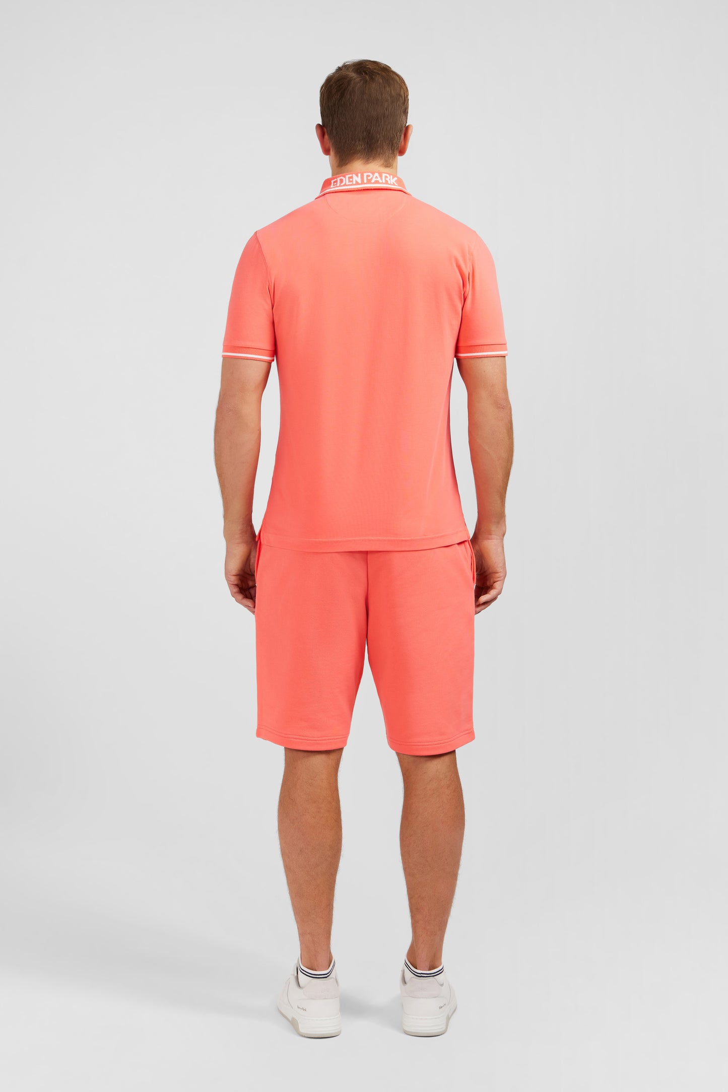 Pink short-sleeved polo shirt