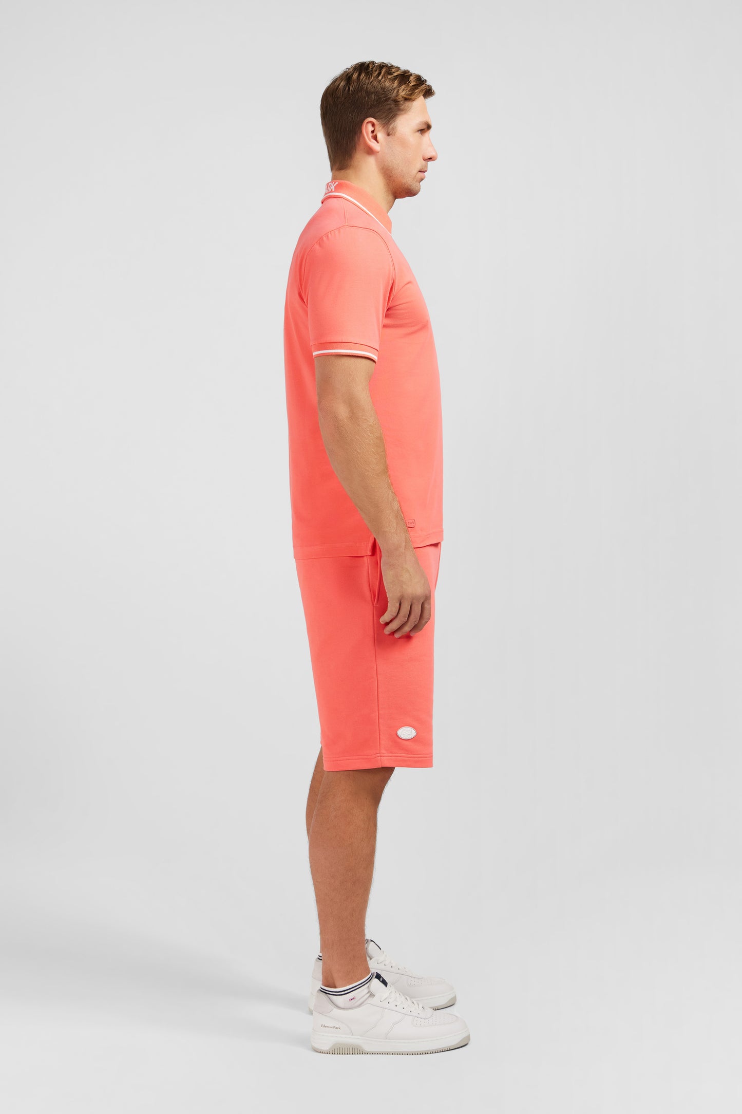 Pink short-sleeved polo shirt