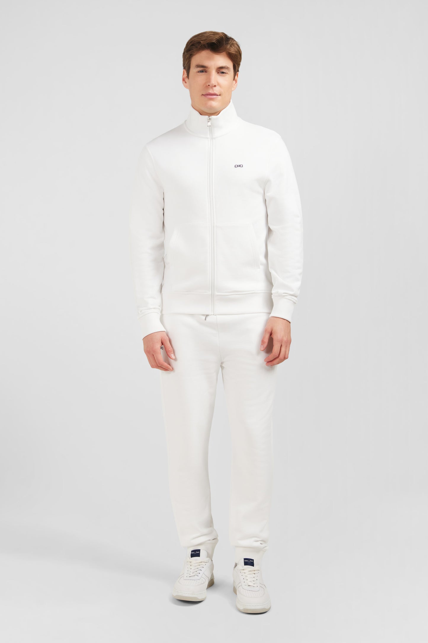 White zipped sweatshirt with stand-up collar