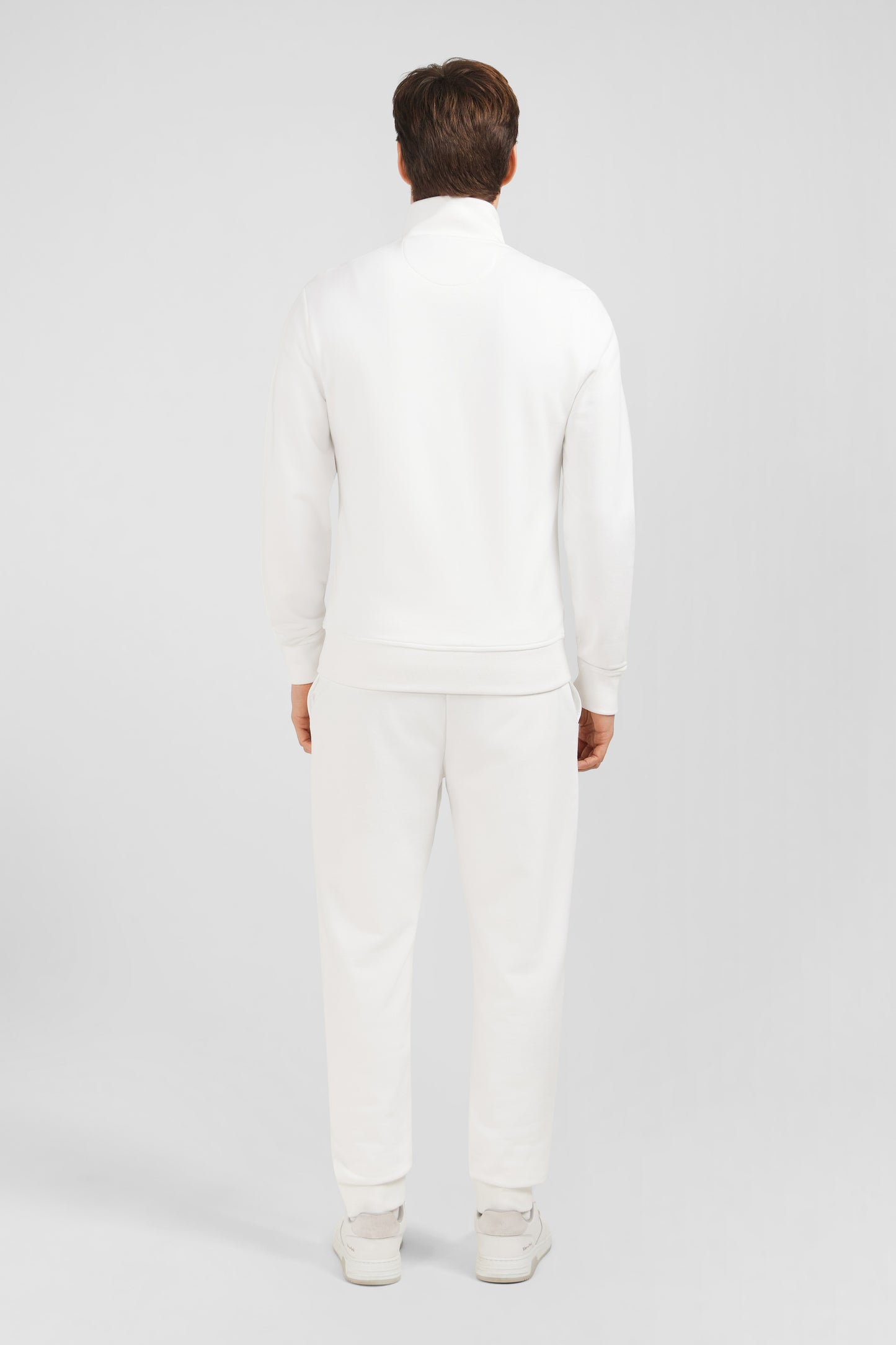 White zipped sweatshirt with stand-up collar