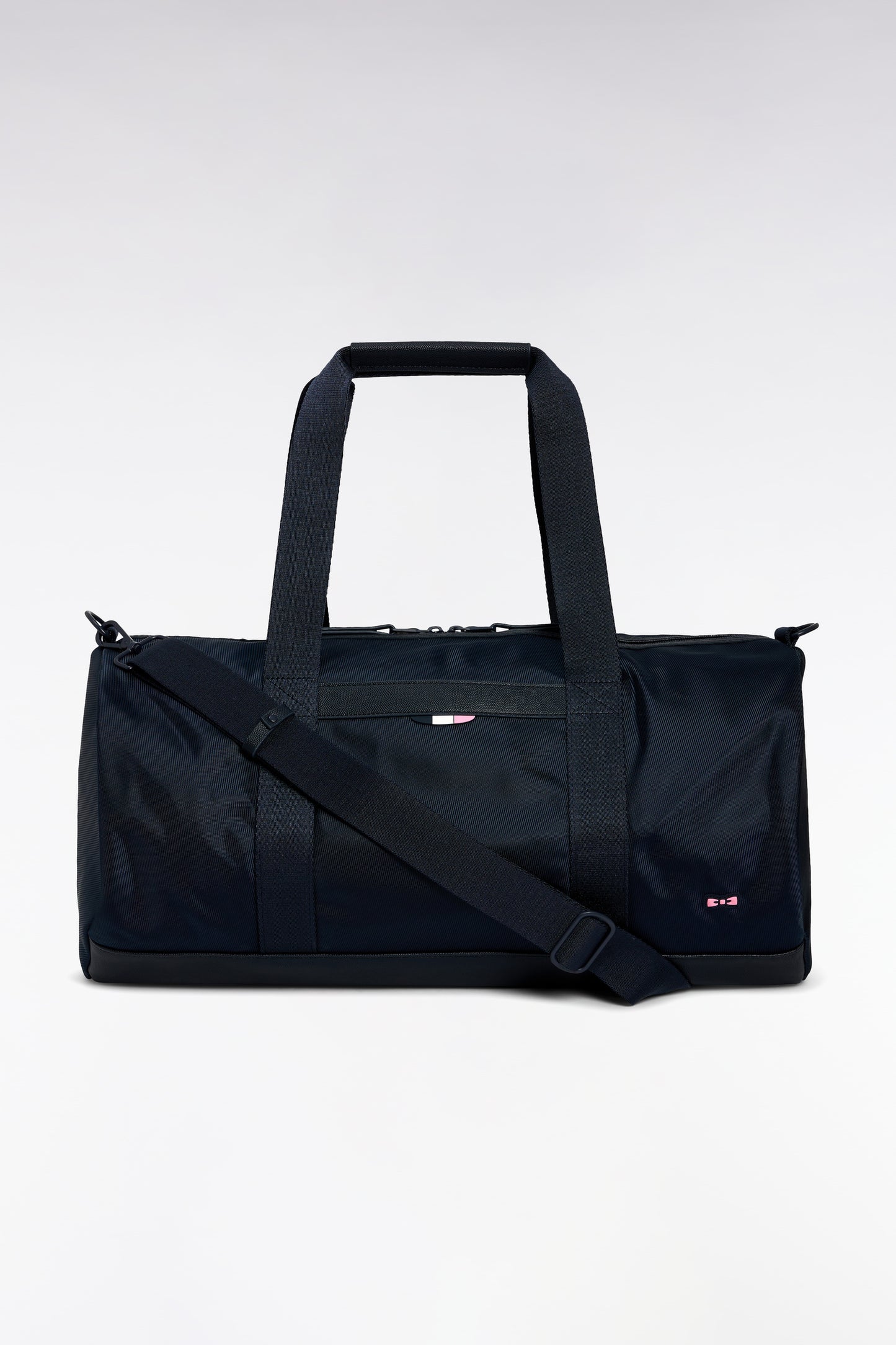 Navy and black duffle bag in leather and fabric