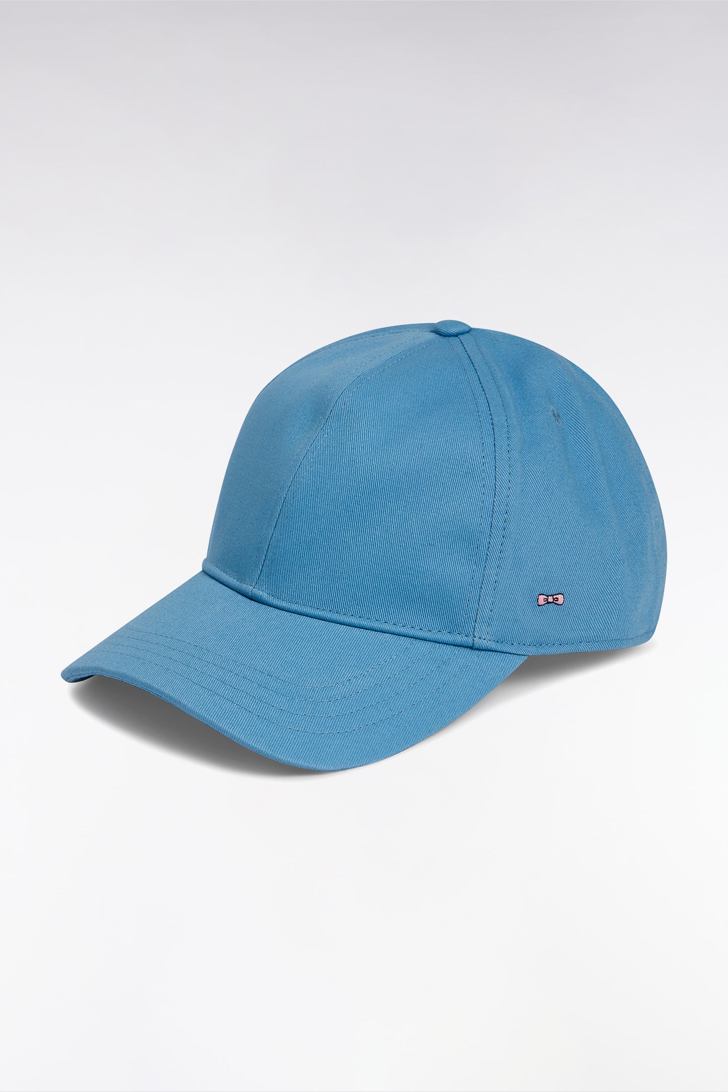 Sky blue cotton twill cap with bow tie embroidery