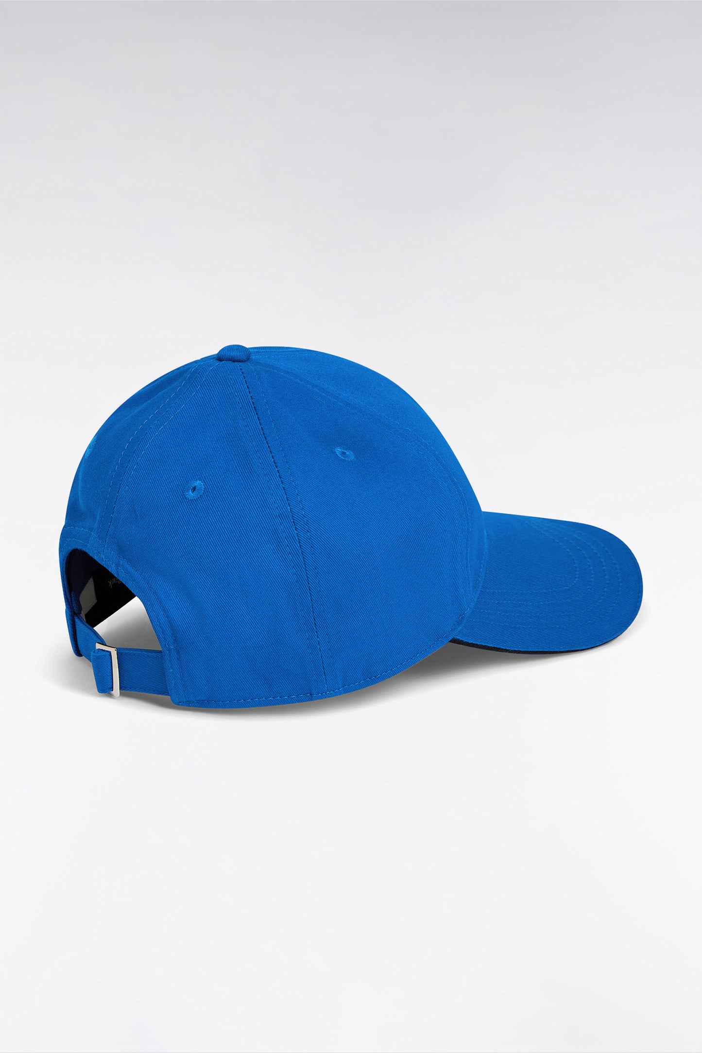 Casquette en twill de coton bleu visière passepoilée