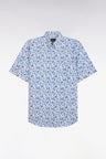 Straight short-sleeved blue shirt in cotton poplin with vegetal print