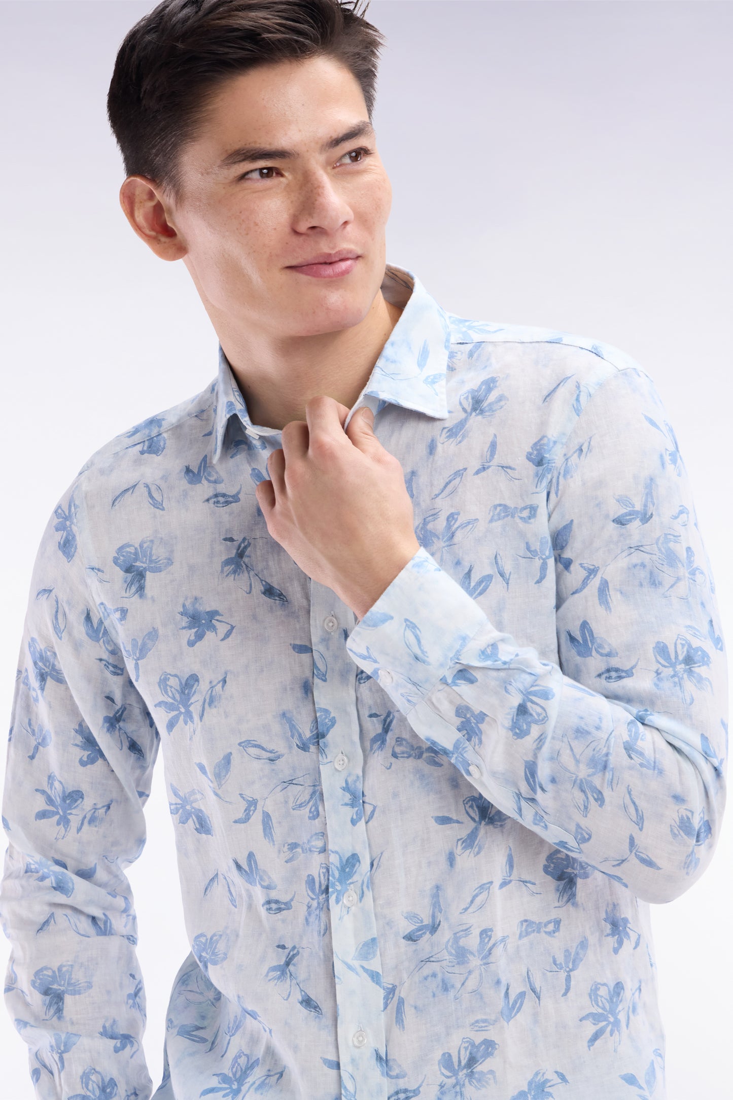 Slim-fit sky blue linen shirt with floral print
