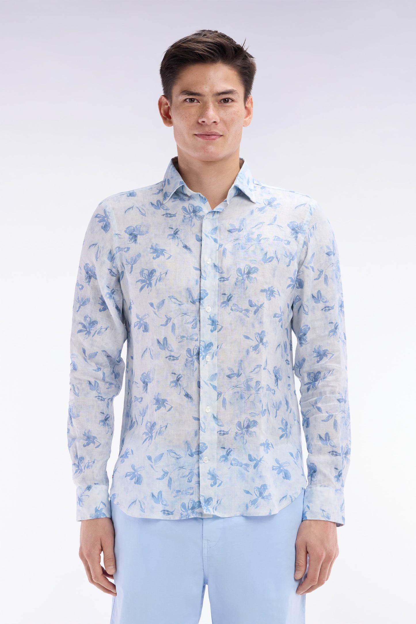 Slim-fit sky blue linen shirt with floral print