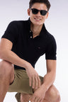 Slim-fit short-sleeved polo shirt in salmon pink stretch cotton piqué
