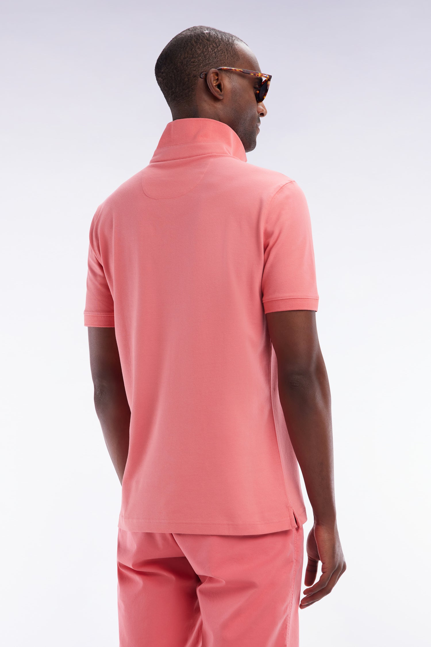 Polo à manches courtes en piqué coton stretch rose saumon coupe ajustée