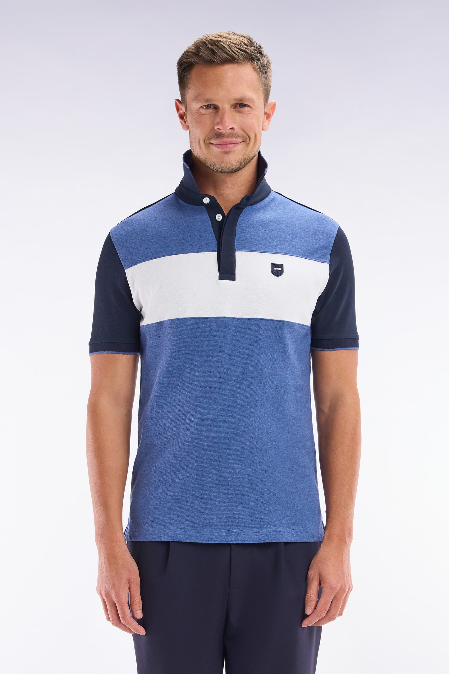 Slim-fit short-sleeved polo shirt in blue stretch cotton with contrasted stripe
