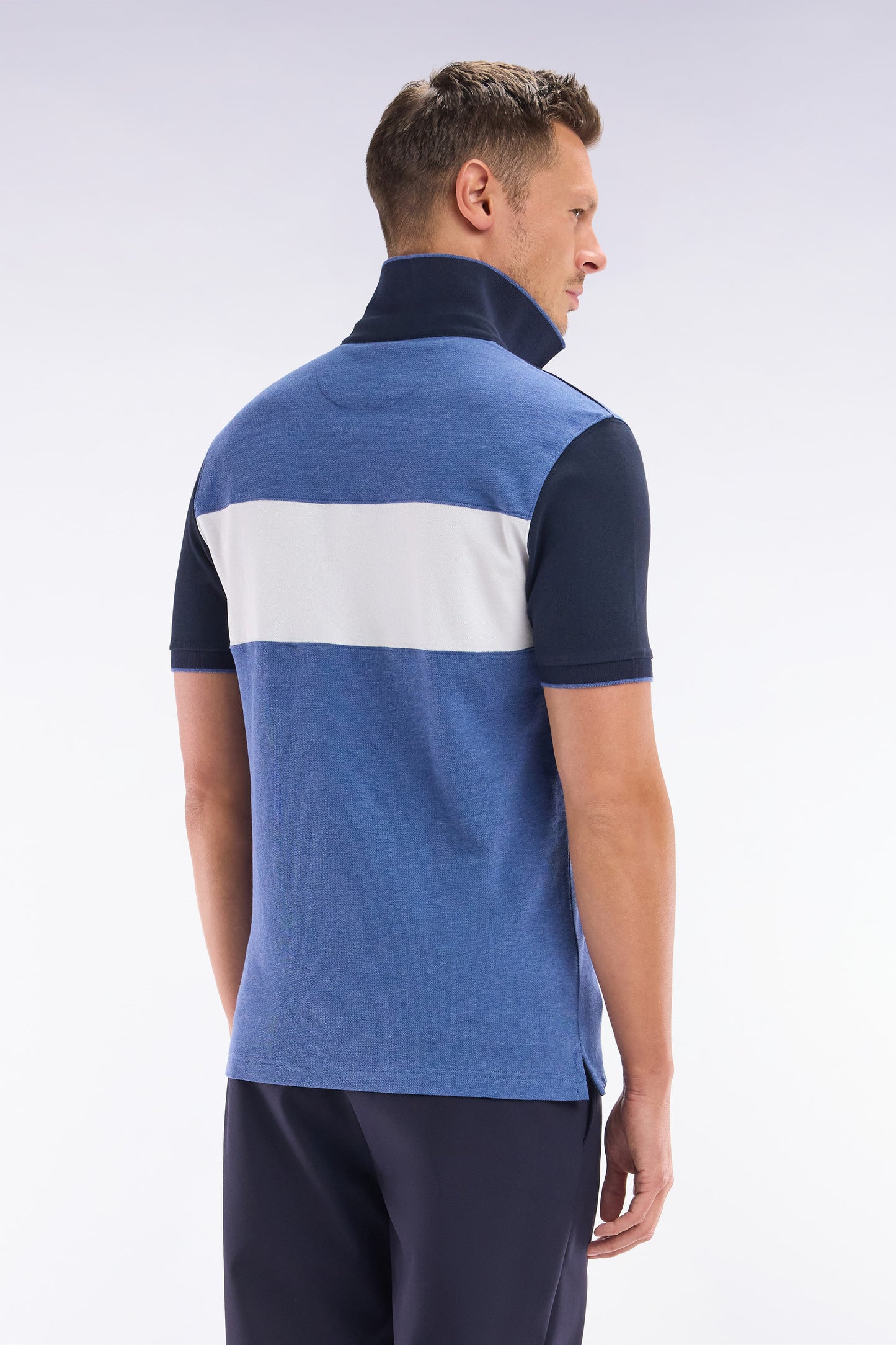 Slim-fit short-sleeved polo shirt in blue stretch cotton with contrasted stripe