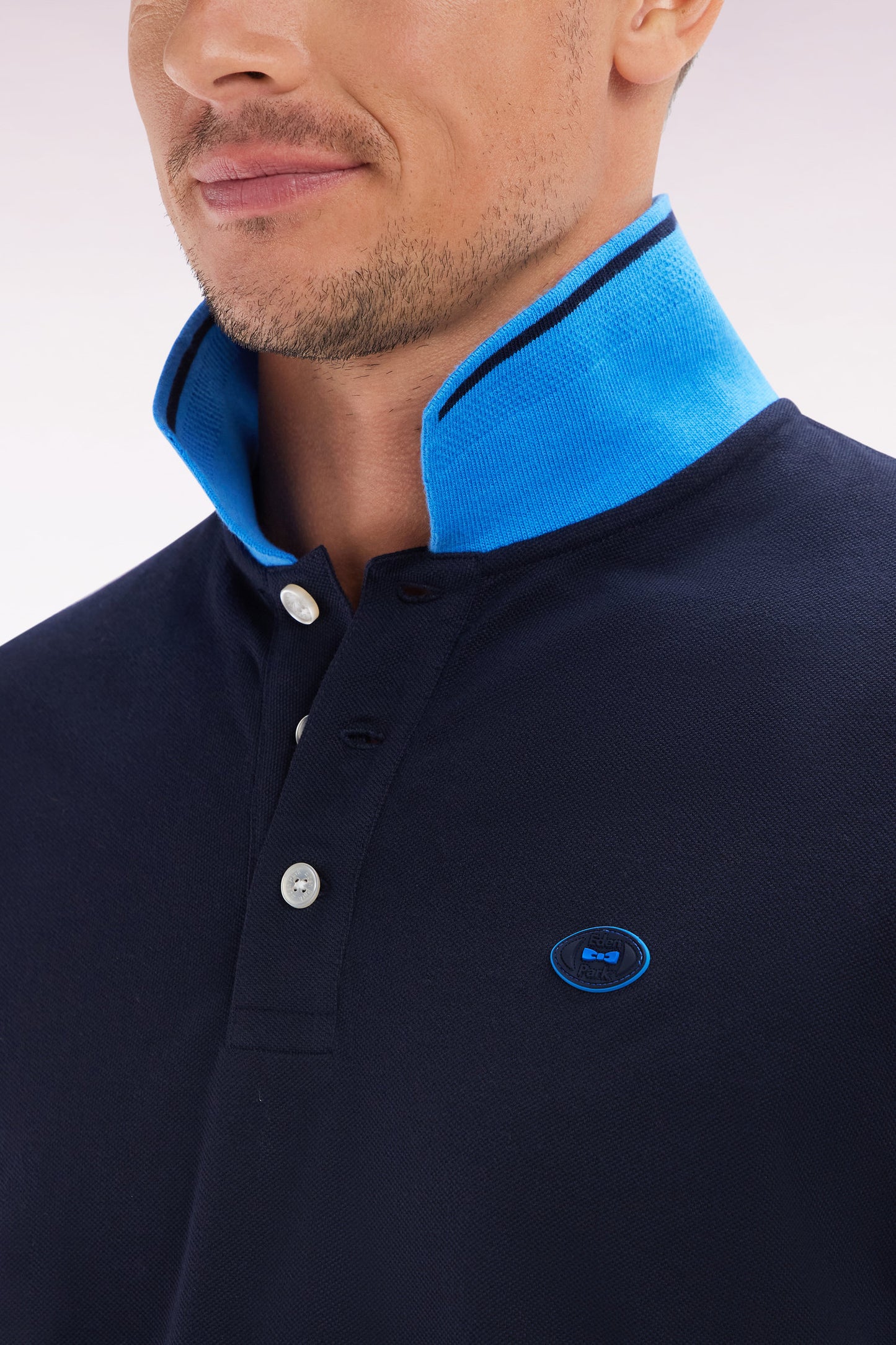 Relaxed-fit short-sleeved polo shirt in navy cotton with colorful accents