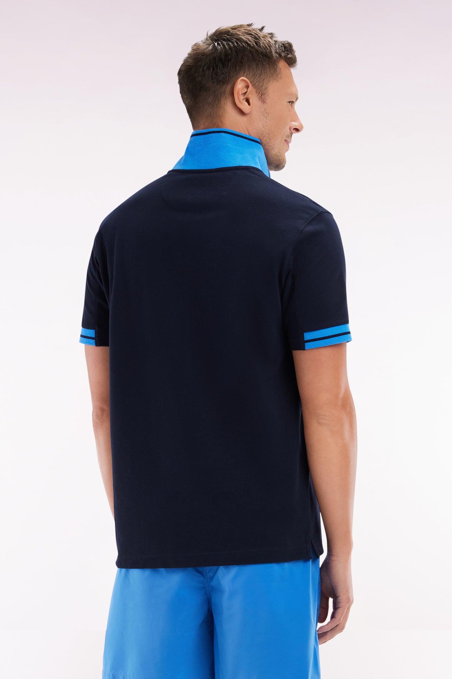 Relaxed-fit short-sleeved polo shirt in navy cotton with colorful accents